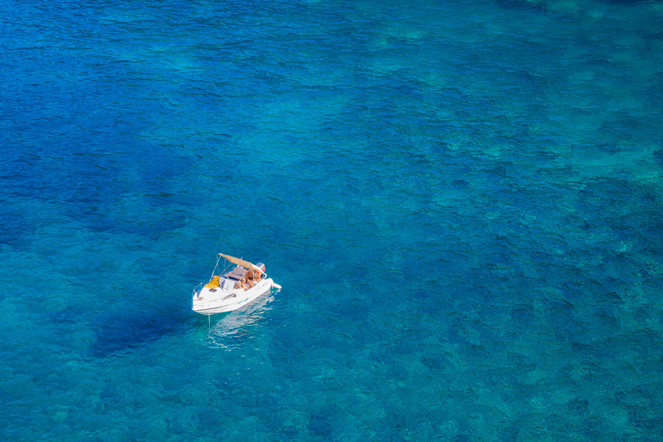 Boat In The Middle Of The Ocean